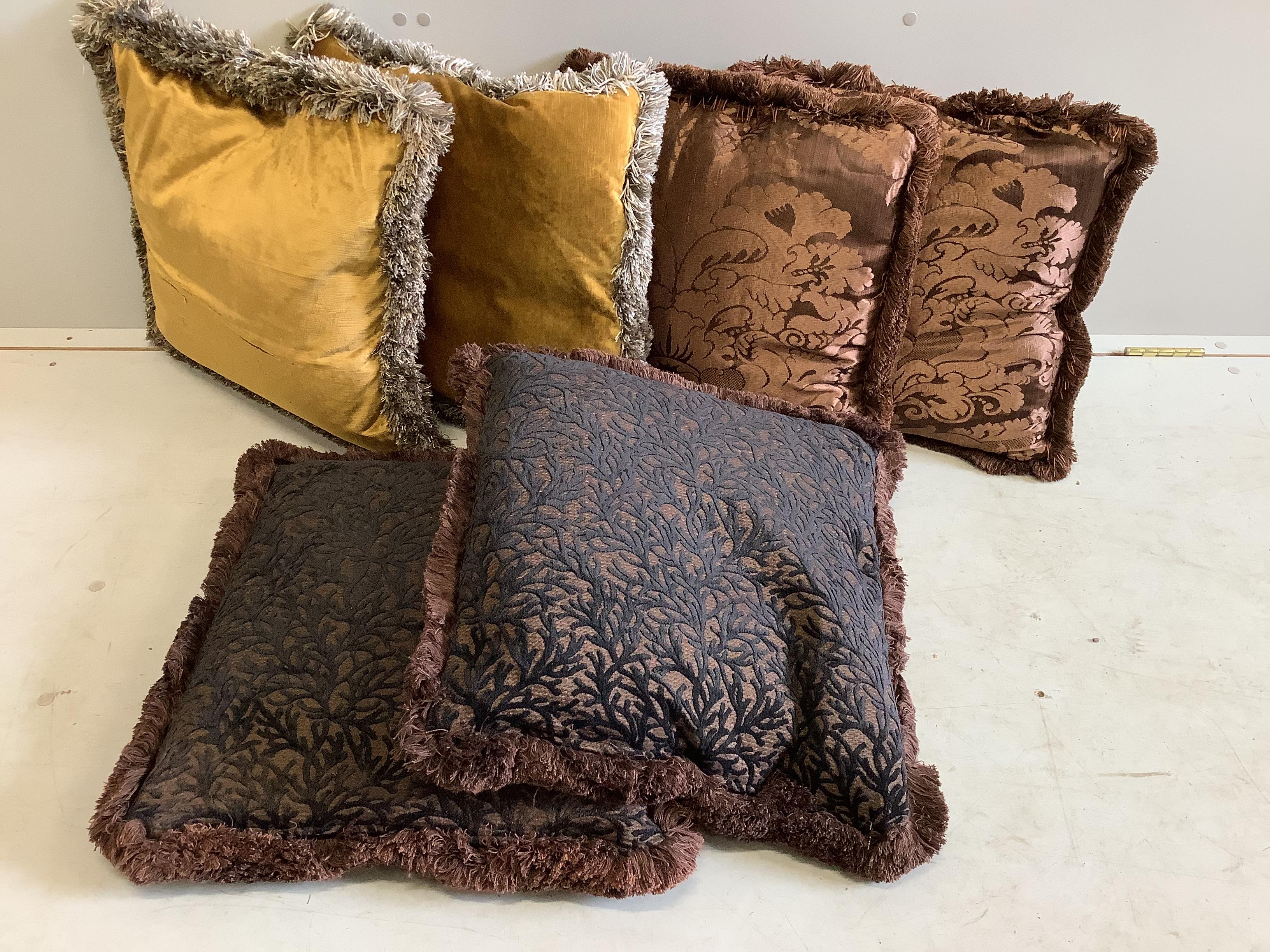 Six designer cushions, largest 46 x 44cm